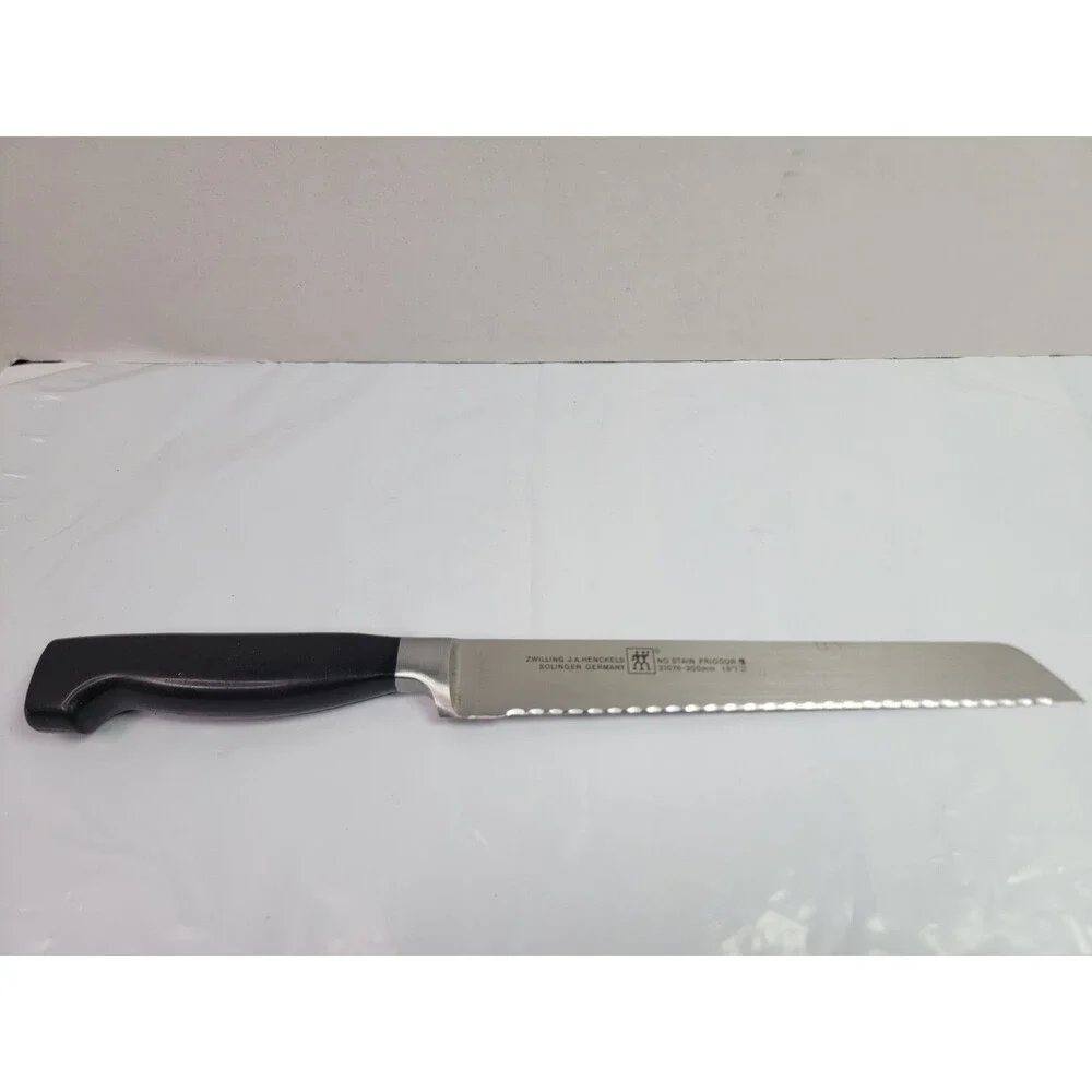 Zwilling J.A. Henckels Four Star 8” Serrated Bread Knife 31076-200 Germany